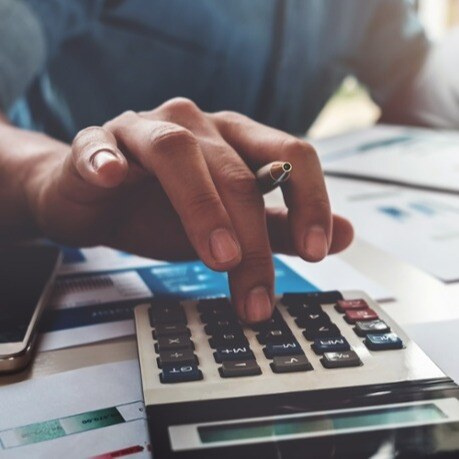 Business-accounting-concept,-Business-man-using-calculator-with-computer-laptop,-budget-and-loan-paper-in-office--941729686_3917x2611-1-1-4